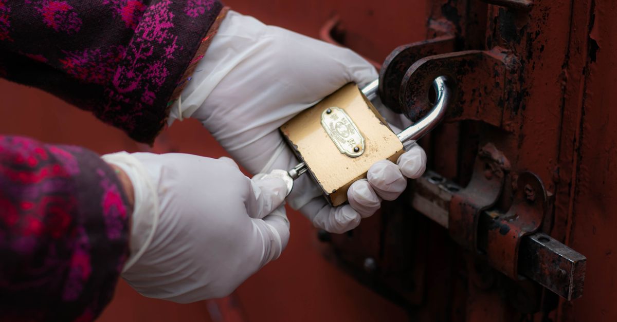 locksmith unlocking front door — Inwood Locksmith